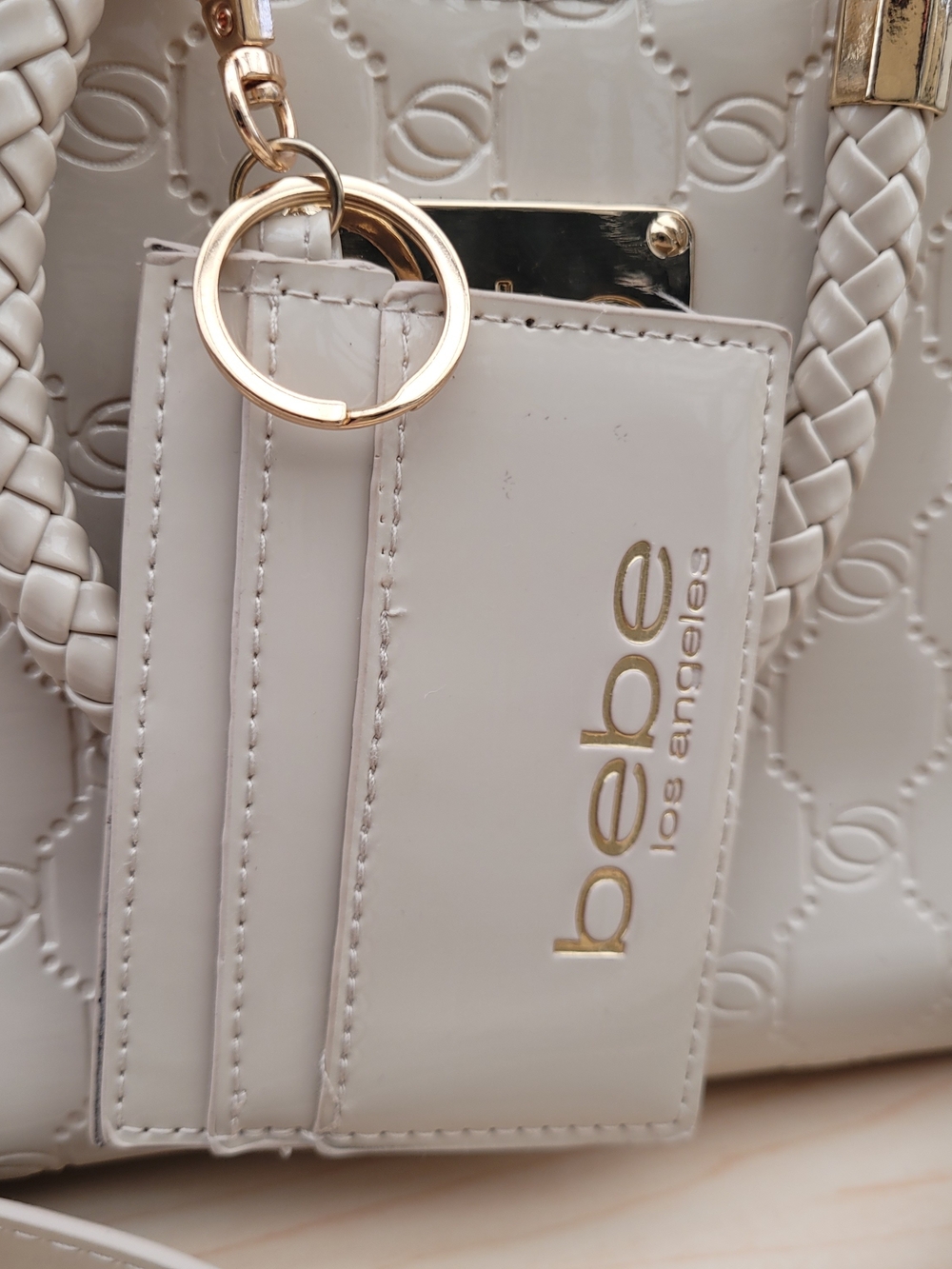 Bebe Cream Embossed Satchel Crossbody Bag – Gold Hardware
Elegant Bebe handbag - Picture 5 of 13